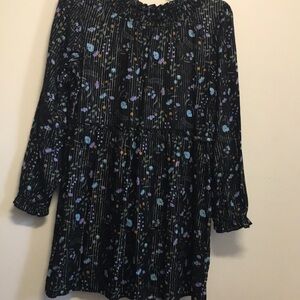 THERE ABOUT girls dress; well taken care of